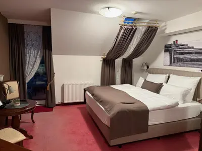 Ein Bett oder Betten in einem Zimmer der Unterkunft Hotel Kaiser