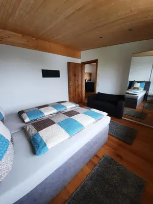 Ein Bett oder Betten in einem Zimmer der Unterkunft Alpha Apartment