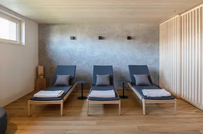 Ein Sitzbereich in der Unterkunft Apartments Pôldi