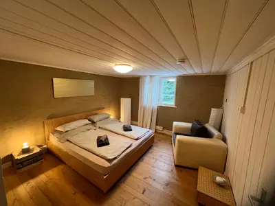 Ein Bett oder Betten in einem Zimmer der Unterkunft Wood Lodge
