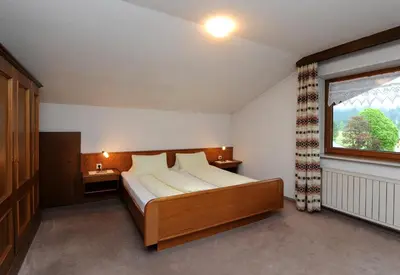 Ein Bett oder Betten in einem Zimmer der Unterkunft Pension Matt