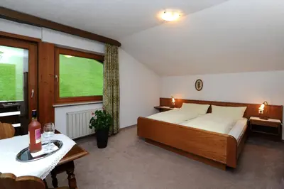 Ein Bett oder Betten in einem Zimmer der Unterkunft Pension Matt