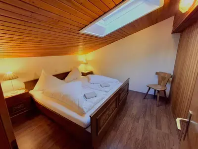 Ein Bett oder Betten in einem Zimmer der Unterkunft Ferienwohnung Tschagguns Top 5