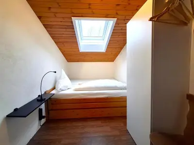 Ein Bett oder Betten in einem Zimmer der Unterkunft Ferienwohnung Tschagguns Top 5