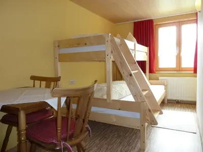 Ein Bett oder Betten in einem Zimmer der Unterkunft Ferienhaus Schwendehof