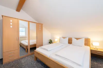 Ein Bett oder Betten in einem Zimmer der Unterkunft Haus Sahin
