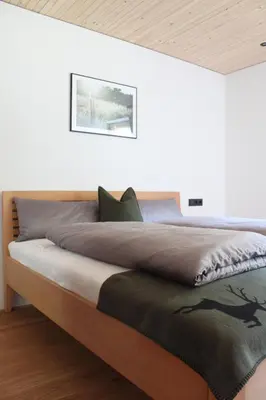 Ein Bett oder Betten in einem Zimmer der Unterkunft Kanis 80