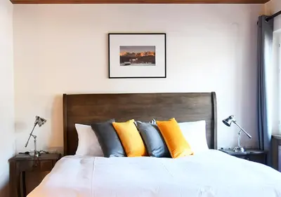 Ein Bett oder Betten in einem Zimmer der Unterkunft Chalet M