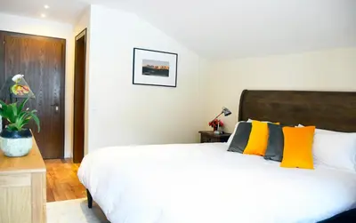 Ein Bett oder Betten in einem Zimmer der Unterkunft Chalet M
