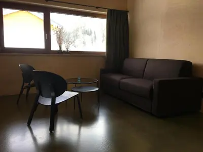 Ein Sitzbereich in der Unterkunft Apartment Hoamelig