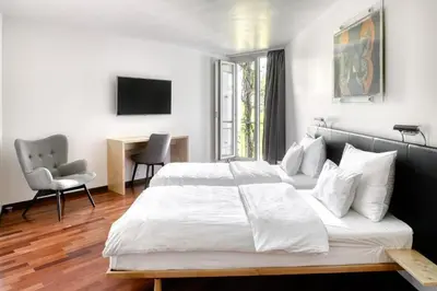 Ein Bett oder Betten in einem Zimmer der Unterkunft Vienna House by Wyndham Martinspark Dornbirn