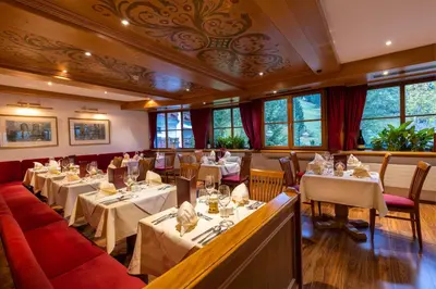 Ein Restaurant oder anderes Speiselokal in der Unterkunft IFA Alpenhof Wildental Hotel Kleinwalsertal Adults only