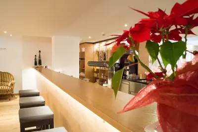 Ein Sitzbereich in der Unterkunft Familienhotel Adler