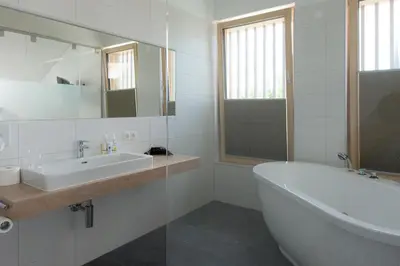 Ein Badezimmer in der Unterkunft Familienhotel Adler