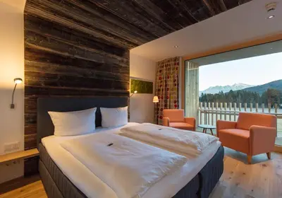 Ein Bett oder Betten in einem Zimmer der Unterkunft Genuss- & Aktivhotel Sonnenburg