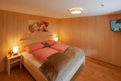 Ein Bett oder Betten in einem Zimmer der Unterkunft Alpin Aparts