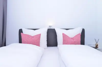 Ein Bett oder Betten in einem Zimmer der Unterkunft Villa Vanessa Kleinwalsertal