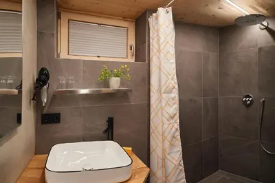 Ein Badezimmer in der Unterkunft Spycher - Chalets für 2