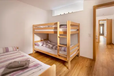 Ein Bett oder Betten in einem Zimmer der Unterkunft Ferienwohnung Valkastiel