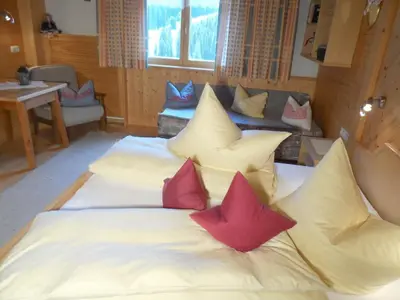 Ein Bett oder Betten in einem Zimmer der Unterkunft Haus Brunneck
