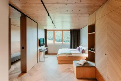 Ein Bett oder Betten in einem Zimmer der Unterkunft Hotel Adler