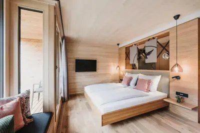 Ein Bett oder Betten in einem Zimmer der Unterkunft Hotel Adler