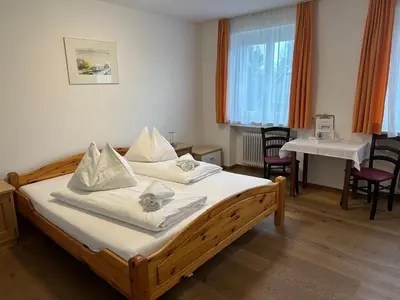 Ein Bett oder Betten in einem Zimmer der Unterkunft Hotel Andreas Hofer