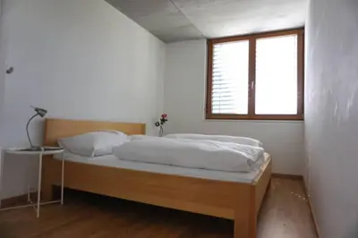 Ein Bett oder Betten in einem Zimmer der Unterkunft Terrassenwohnung in prämierter Wohnanlage