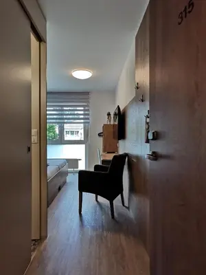 Ein Sitzbereich in der Unterkunft Motel Hohenems