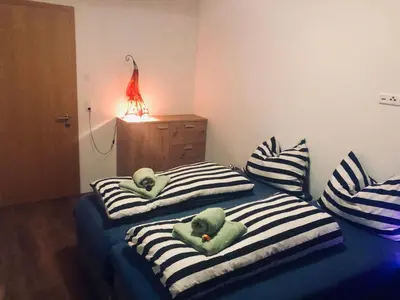 Ein Bett oder Betten in einem Zimmer der Unterkunft Villa Alma Arlberg