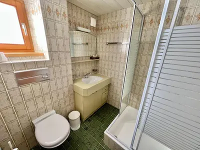 Ein Badezimmer in der Unterkunft Lech Hostel
