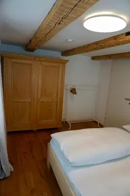 Ein Bett oder Betten in einem Zimmer der Unterkunft Beeindruckende Wohnung im Rheintal