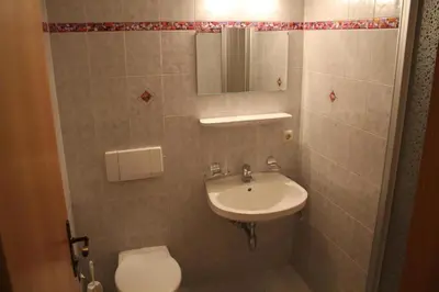 Ein Badezimmer in der Unterkunft Gasthof Paluda - Pizzeria