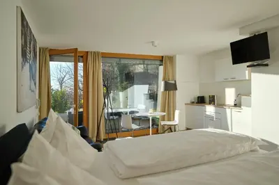 Ein Bett oder Betten in einem Zimmer der Unterkunft Charmantes Apartment in Bregenz - perfekt für Aktive & Genießer