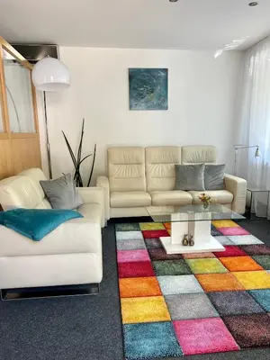 Ein Sitzbereich in der Unterkunft Glads Apartment