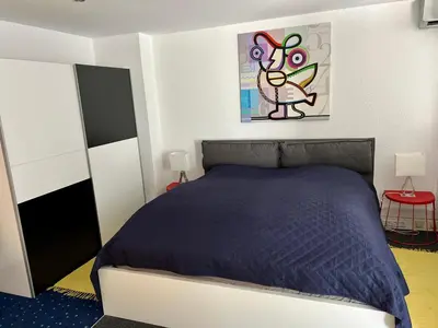 Ein Bett oder Betten in einem Zimmer der Unterkunft Glads Apartment