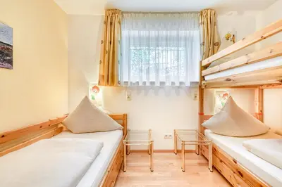 Ein Bett oder Betten in einem Zimmer der Unterkunft Panoramavilla Bludenz by A-Appartments