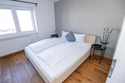 Ein Bett oder Betten in einem Zimmer der Unterkunft Terrassenwohnung in Götzis