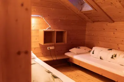 Ein Bett oder Betten in einem Zimmer der Unterkunft NigschHof