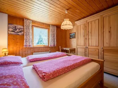 Ein Bett oder Betten in einem Zimmer der Unterkunft Ferienhaus Türtscher 1