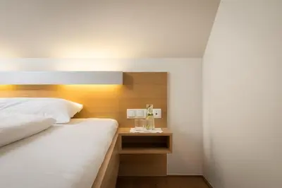 Ein Bett oder Betten in einem Zimmer der Unterkunft OXA - Easy Escape - Bed & Breakfast