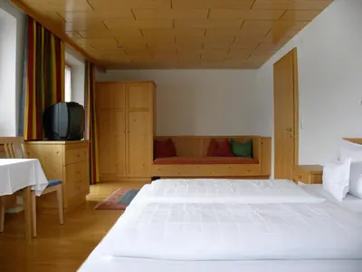 Ein Bett oder Betten in einem Zimmer der Unterkunft Ferienhaus Bergland
