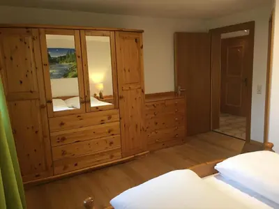 Ein Bett oder Betten in einem Zimmer der Unterkunft Ferienwohnung Thöny