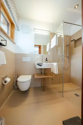 Ein Badezimmer in der Unterkunft Landhaus Valfontana