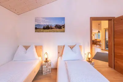 Ein Bett oder Betten in einem Zimmer der Unterkunft Gauensteiner Hof