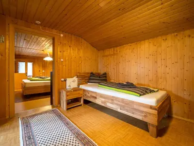 Ein Bett oder Betten in einem Zimmer der Unterkunft Vonderleu