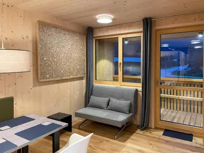 Ein Sitzbereich in der Unterkunft Apartment Bergblick-Mellau mit E-Ladesäule