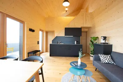 Ein Sitzbereich in der Unterkunft Masura Cabins