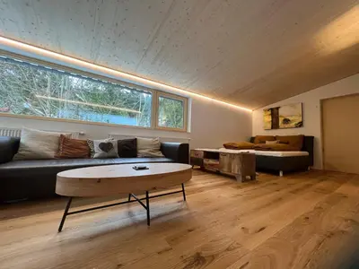 Ein Sitzbereich in der Unterkunft River Lodge