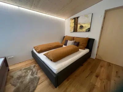 Ein Bett oder Betten in einem Zimmer der Unterkunft River Lodge